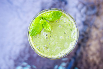 Blended Green Smoothie for Breakfast, Selective Focus, Top View, Healthy Food Concept