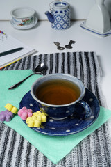 colorful of Thai dessert with a cup of tea