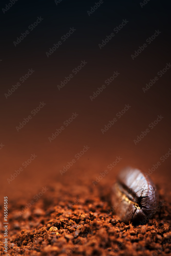 Poster roasted coffee with roasted coffee bean on dark chocolate color background , copy space, macro image