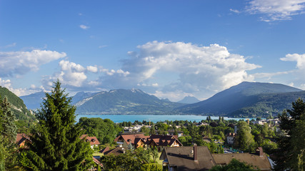 Landscape of Annecy from above. City, lake and mountains view in the late afternoon. France, Haute Savoie