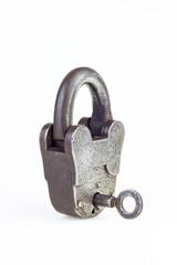 Old rusty padlock and key  isolated  background