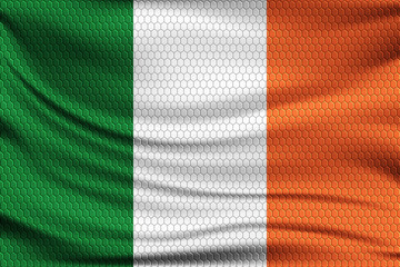 National flag of Ireland on wavy fabric with a volumetric pattern of hexagons. Vector illustration.