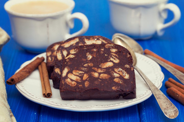 chocolate dessert on white dish on wooden background