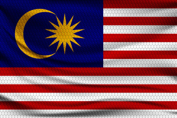 National flag of Malaysia on wavy fabric with a volumetric pattern of hexagons. Vector illustration.