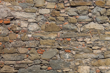 Old red brick and stone wall