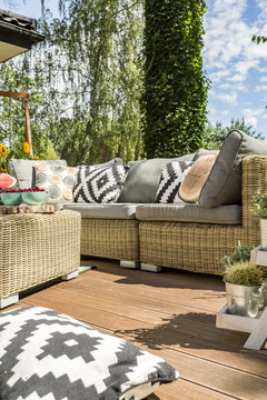 Garden furniture in stylish house veranda