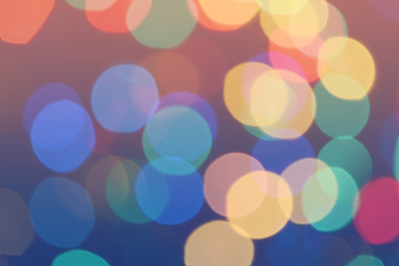 Bokeh lights background. Colorful bokeh circles defocused background. Holiday bokeh. Photo can be...