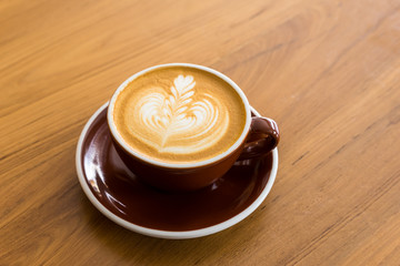 Cup of coffee with beautiful Latte art, selective focus