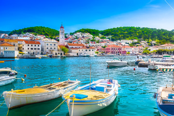 Pucisca Brac adriatic place. / Seafront scenery of small mediterranean village Pucisca on Island Brac, tourist summer resort in Croatia, Europe. - 165569320
