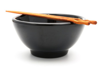 empty black bowl and chopstick isolated