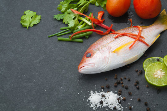 delicious portion of fresh fish fillet with aromatic herbs spices