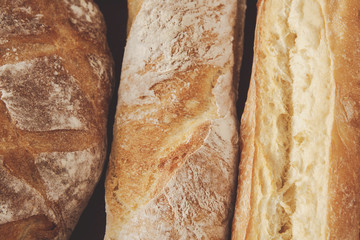 Bread texture background, closeup of baguette loaf