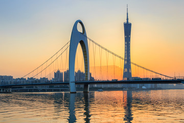 Modern bridge in Zhujiang River and modern building of financial district in guangzhou city, china