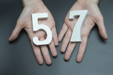 On the female palms figure fifty-seven.