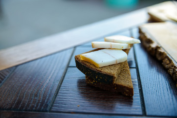 Close up piece of rye bread and lard