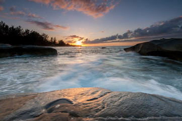 long exposure sunset seascape at Kudat Malaysia. Image contain soft focus due to long exposure.
