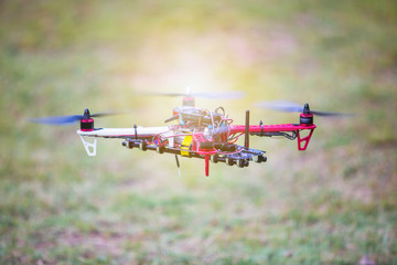 Professional carbon drone with GPS and video camera making a ride.drone for aerial photography prepared.