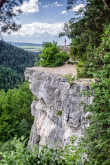 Hiker on the rock in Slovak paradise