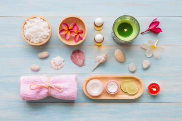 Fototapeta premium Spa set on blue rustic wooden board background, Beauty and fashion concept, top view , flat lay