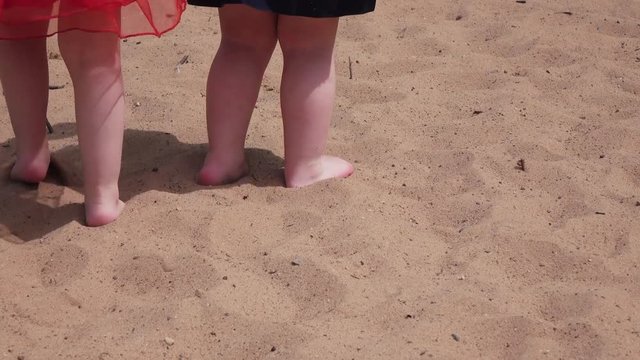 Little girl in a sandbox