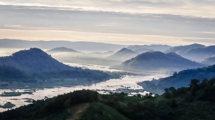 Fototapeta na wymiar mountain with fog landscape on morning at phu pha duk, Nong Khai, Thailand.