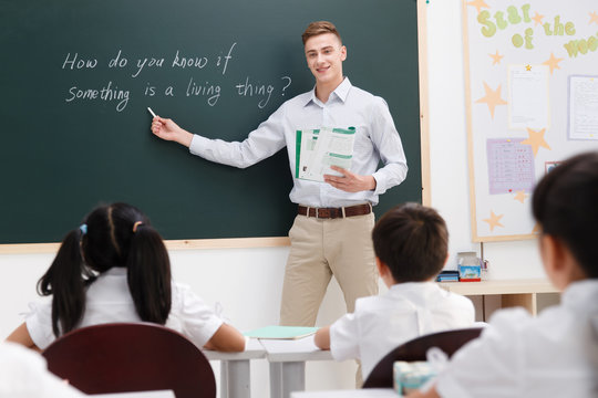 The teachers and pupils are in the classroom