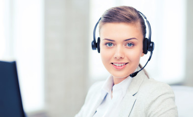female helpline operator with headphones