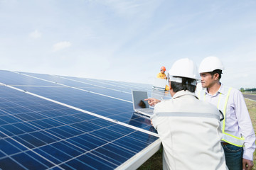 Team engineers checking solar cells. Solar cells have been maintained and maintenance by a team of engineers.