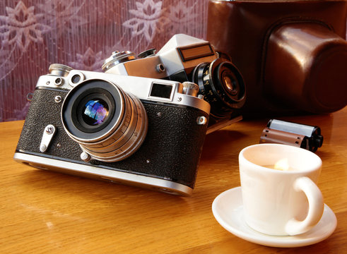 Vintage camera on wooden table