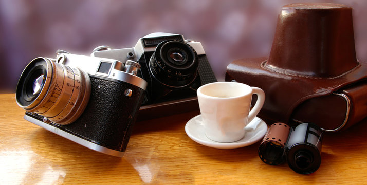 Vintage camera on wooden table