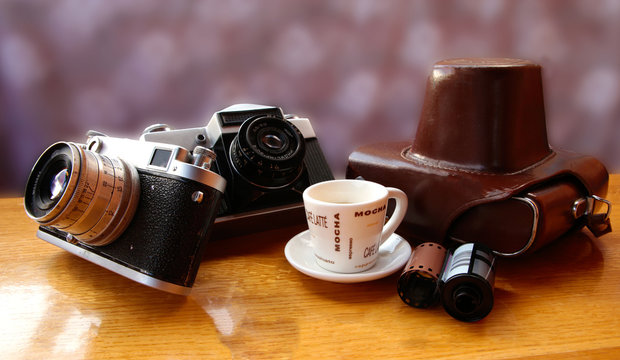 Vintage camera on wooden table
