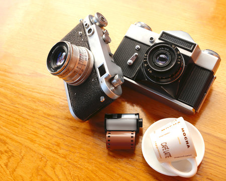 Vintage camera on wooden table