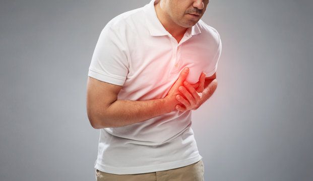 Close Up Of Man Suffering From Heart Ache