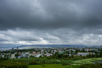 Iceland - Reykjavik City from above with dark clouds