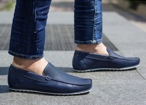 A Man In Blue Moccasins