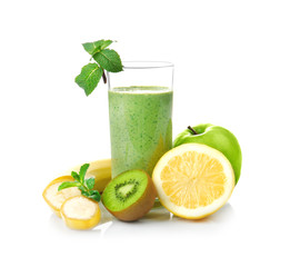Glass of fresh juice and fruits  on white background