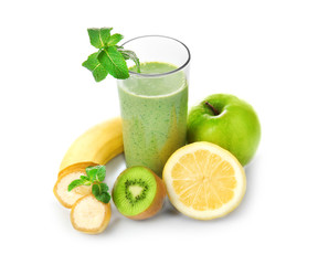 Glass of fresh juice and fruits  on white background