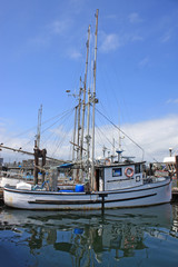 Fototapeta na wymiar Fishing boat in Victoria harbor