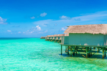 Beautiful water villas in tropical Maldives island  .