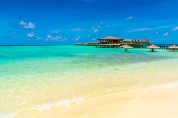 Beautiful water villas in tropical Maldives island  .