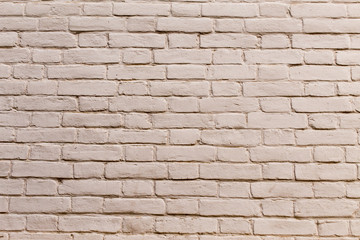 Painted white brick wall. Grunge color background. Background and textures photography. Abstract texture for designers. Background of brick wall texture.