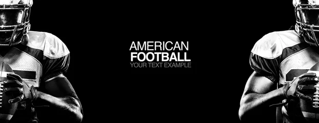 Sport concept. American football sportsman player on black background with copy space. Sport concept. © Mike Orlov