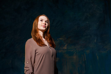 Red-haired young pretty girl