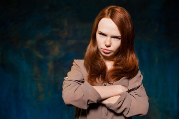 Fototapeta premium scared red-haired woman posing
