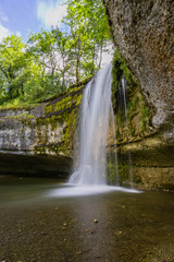 Fototapeta na wymiar Waterfalls of the river Le Hérisson, in the French Jura