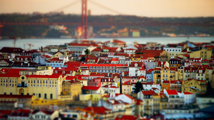 Beautiful colorful sunset landscape aerial view of Lisbon, miniature tilt-shift view