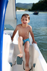 Child on catamaran