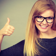 Portrait of happy blonde woman smiling with joy