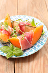 slices of melon with prosciutto