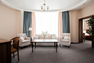 Naklejka na ściany i meble Hotel apartment, living room interior in the morning